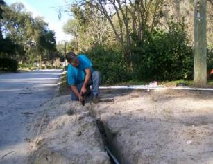 A Centennial Sprinkler Repair Tech Installs New Irrigation SystemS